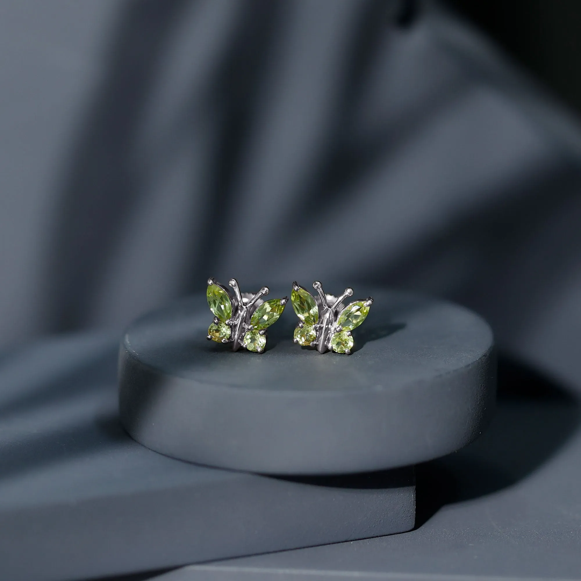 2 CT Butterfly Stud Earrings with Round and Marquise Cut Peridot