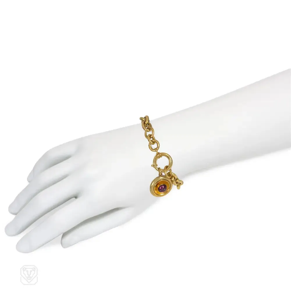 Antique gold mariner link bracelet with garnet charm