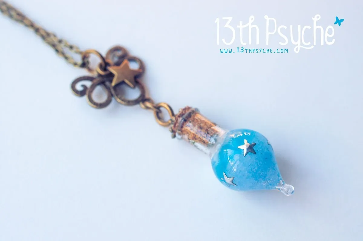 Glow in the dark blue teardrop vial pendant necklace