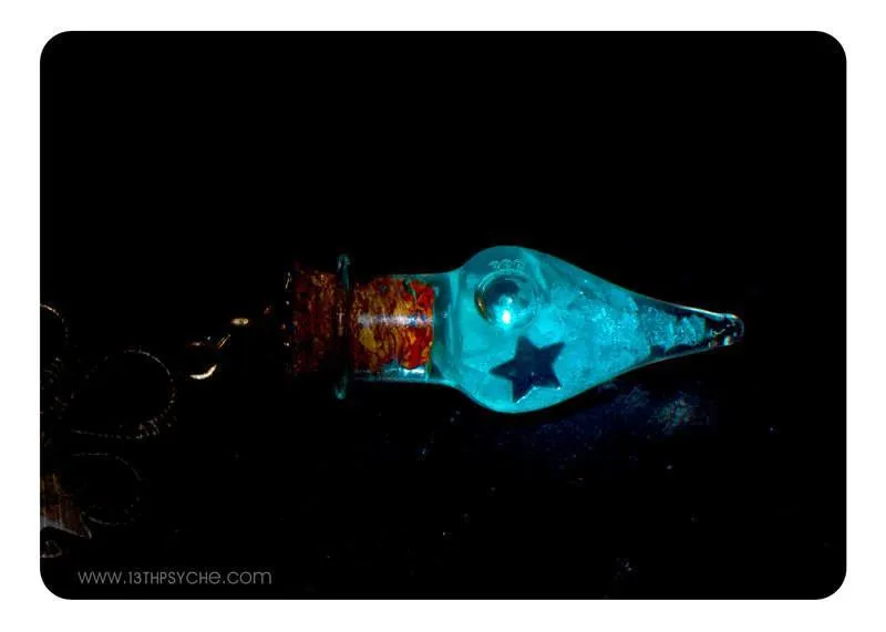 Glow in the dark blue teardrop vial pendant necklace