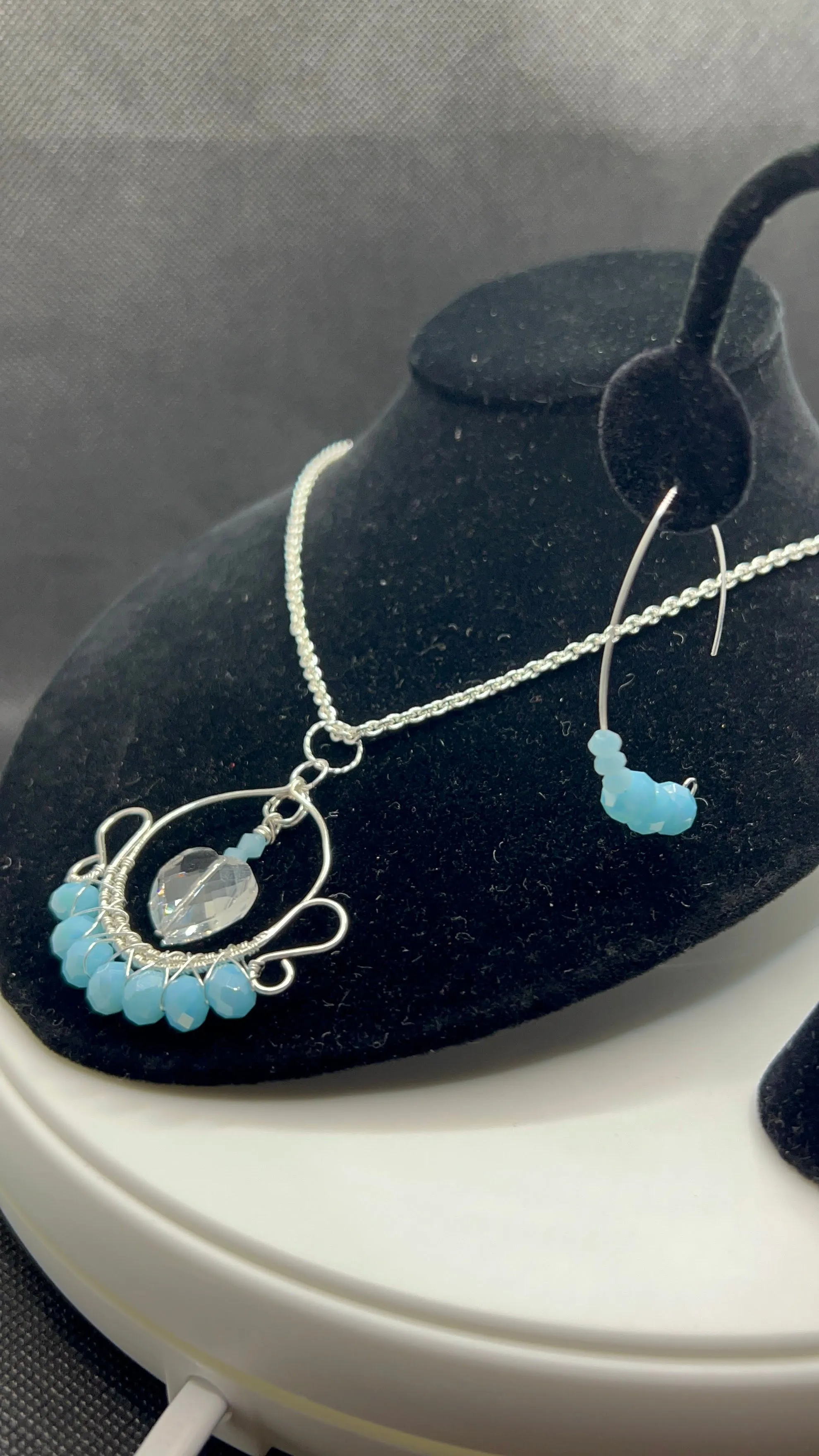 Sky Blue Crystals and Heart Wrapped Pendant Necklace and Earrings